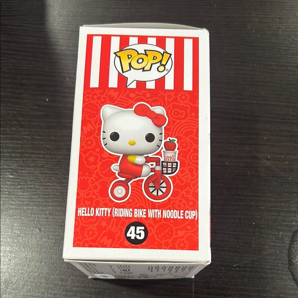 Hello Kitty Riding Bike Vinyl Figure - Picture 4 of 4